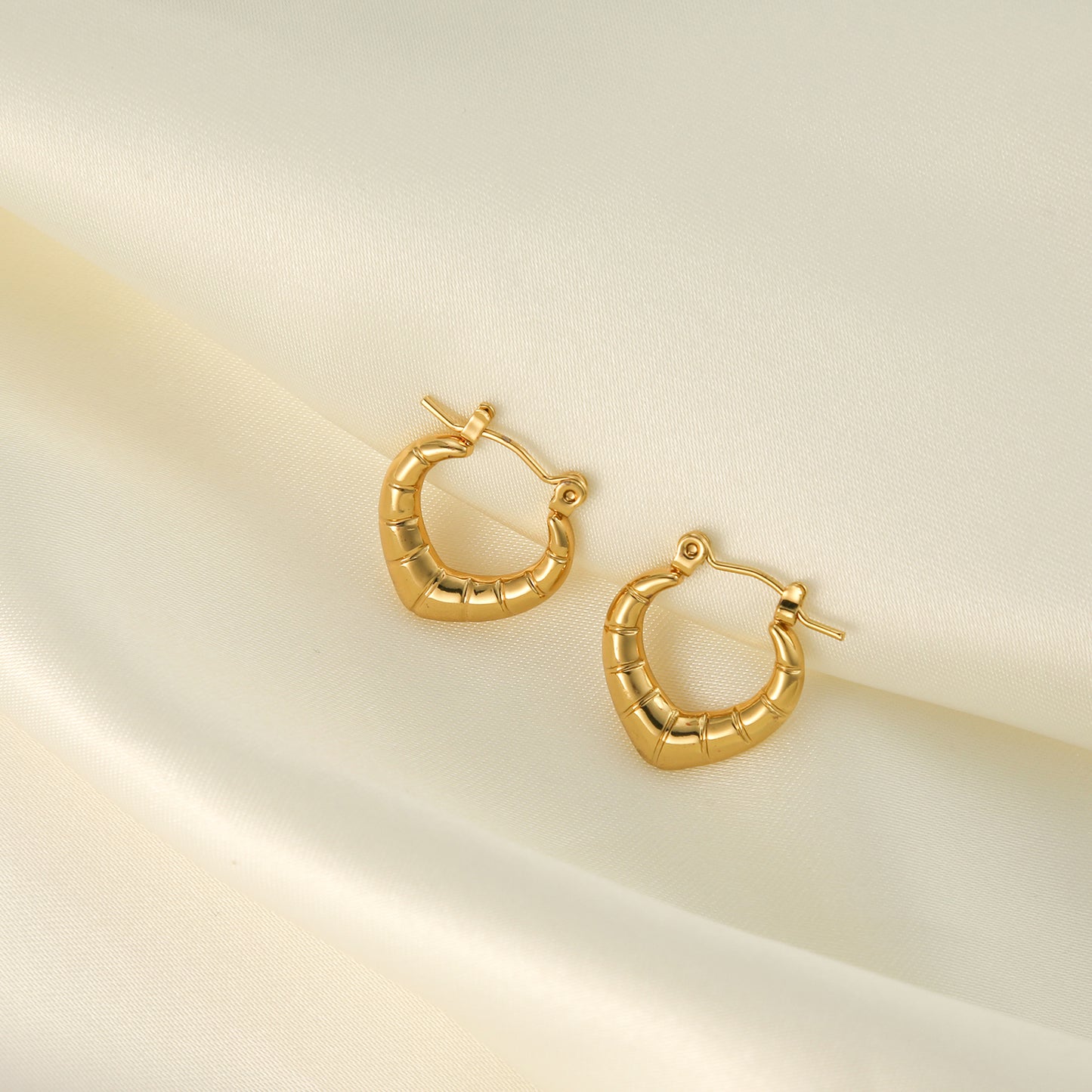 Bastira Earrings